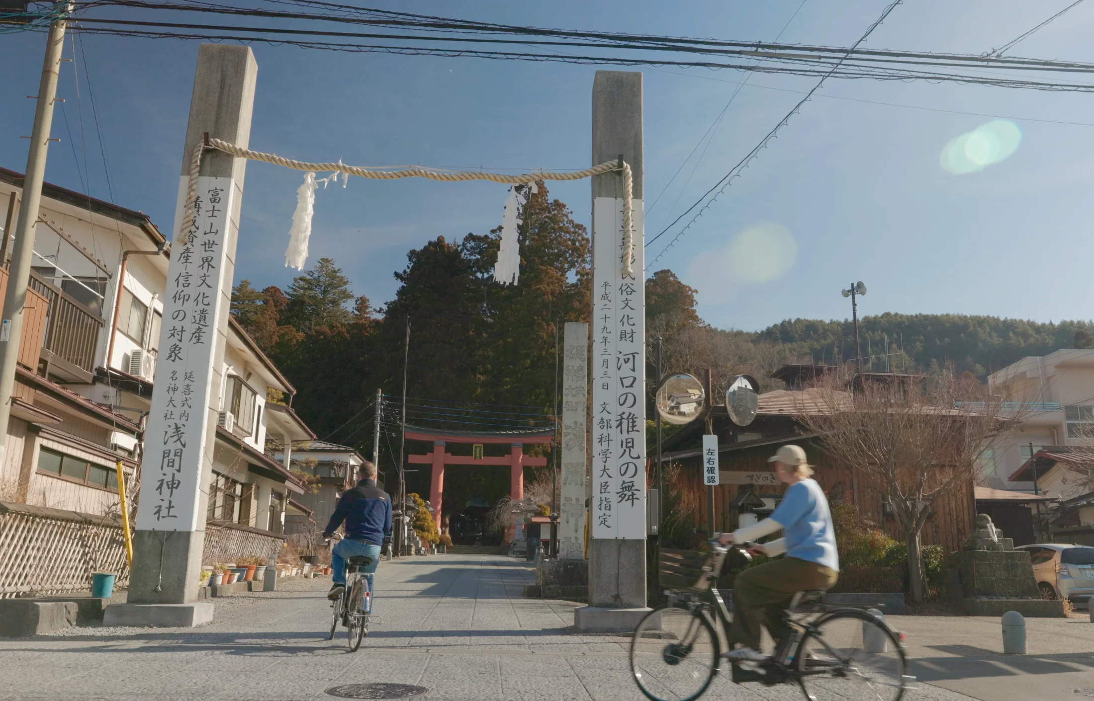 People ridding electrical bikes